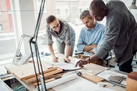 The Vantage Homes team reviewing plans together